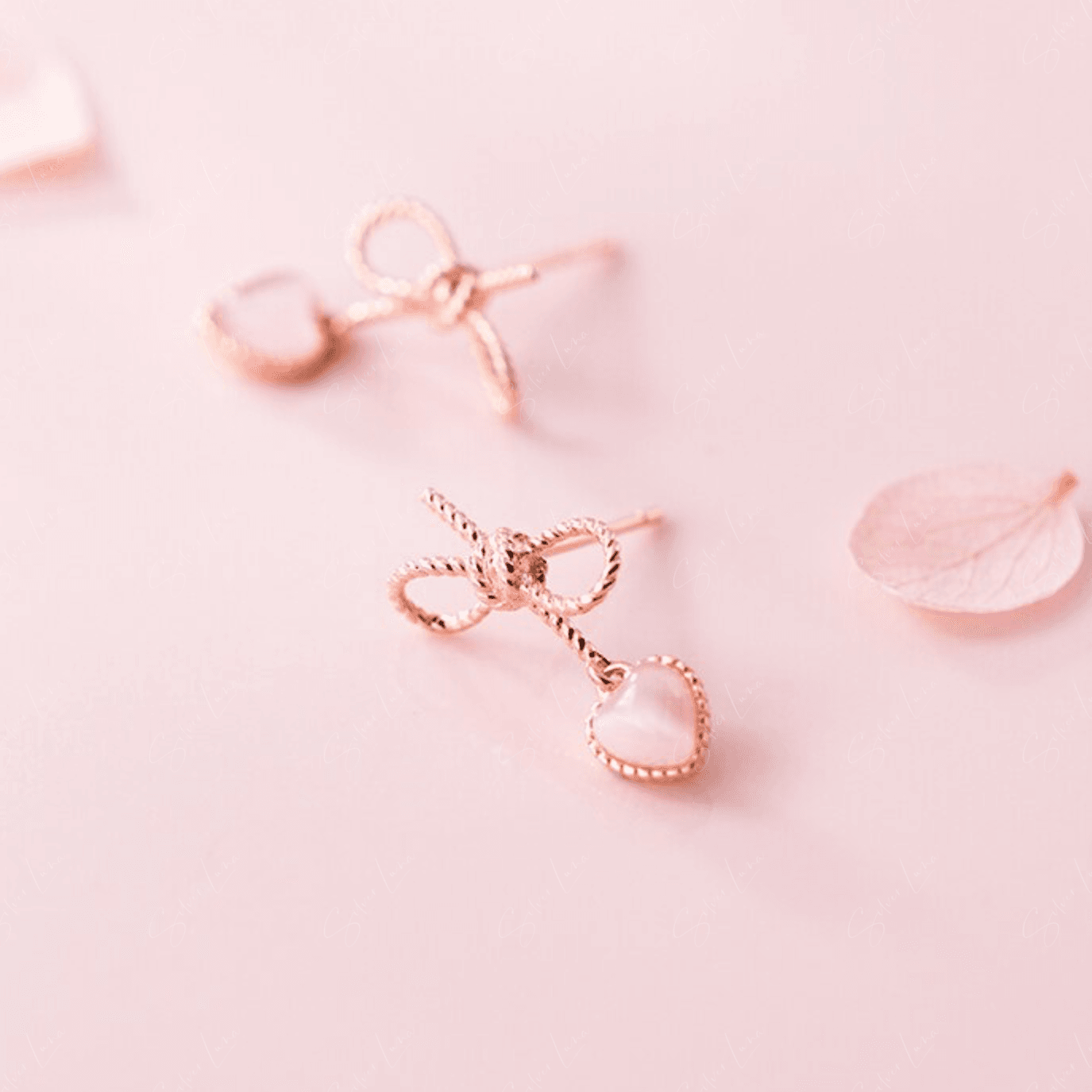 Rose gold bowtie heart drop sterling silver earrings