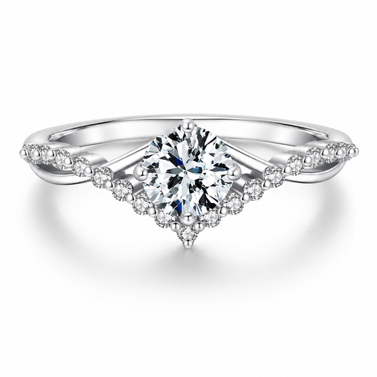 Silver ring with a large diamond and smaller diamonds on the band against a white background