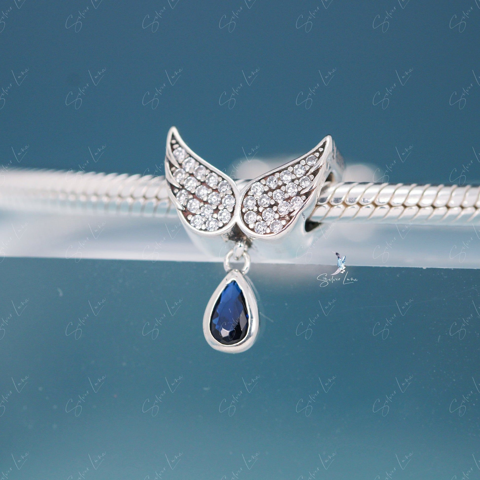 angel wing teardrop charm