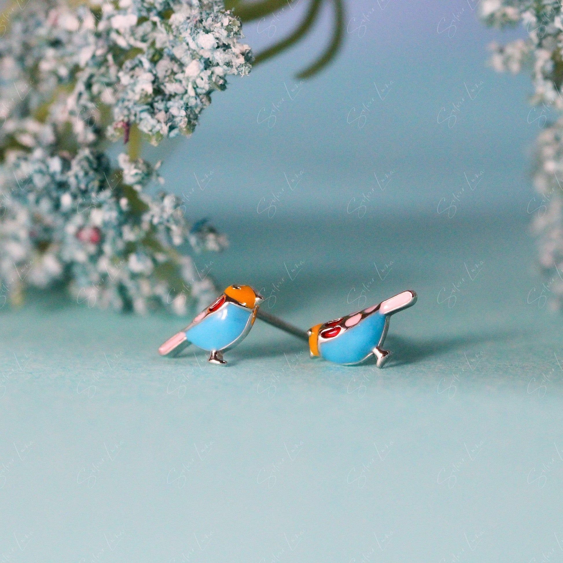 bird silver stud earrings