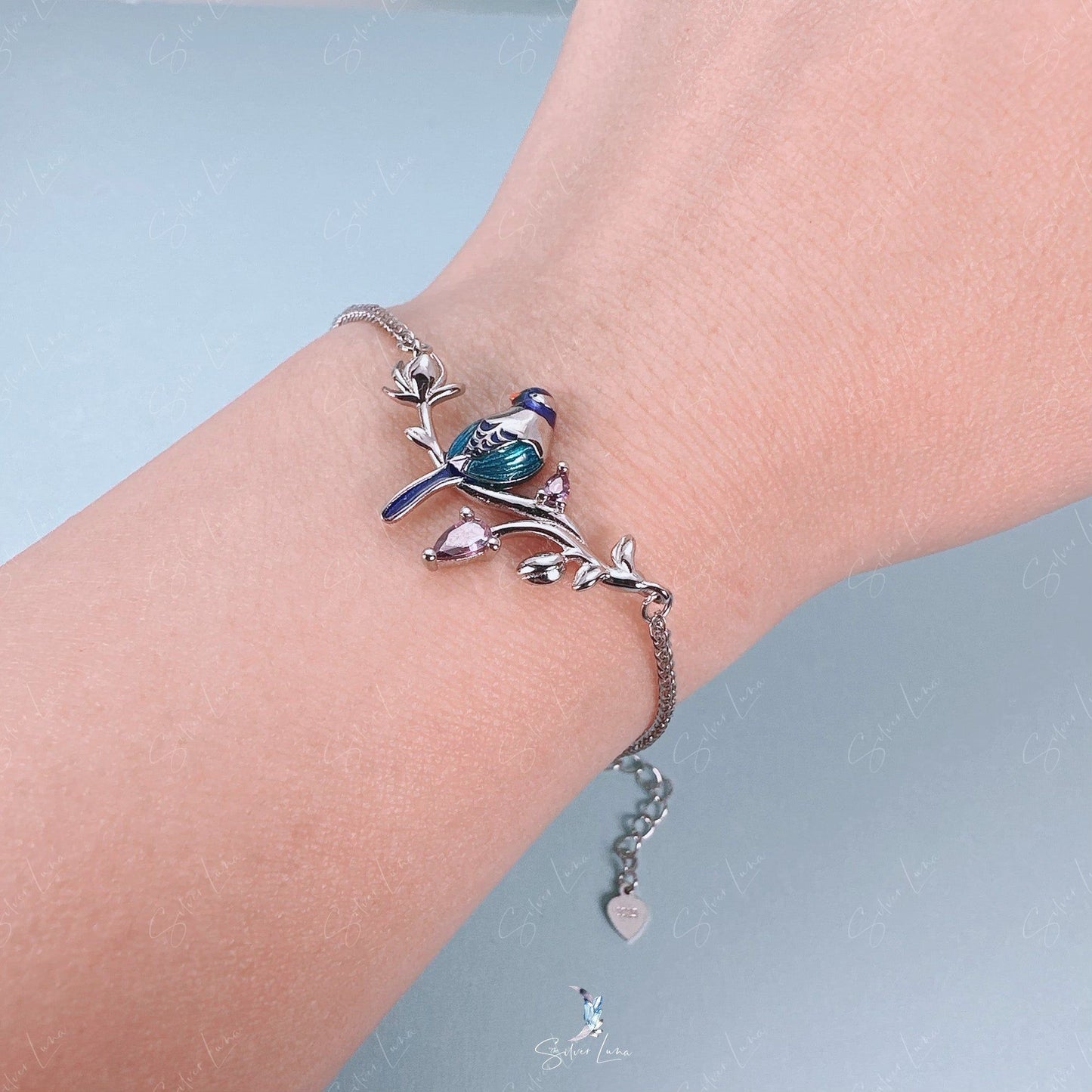 blue mockingbird on branch bracelet