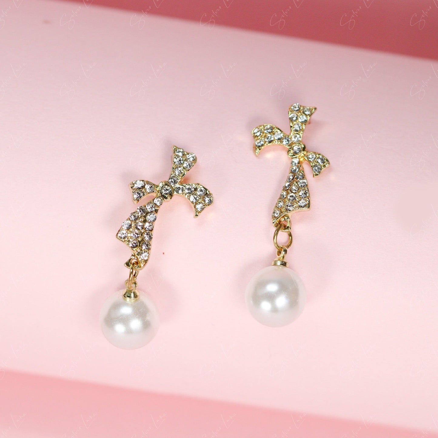 Crystal rhinestones bow tie with pearl drop fashion earrings