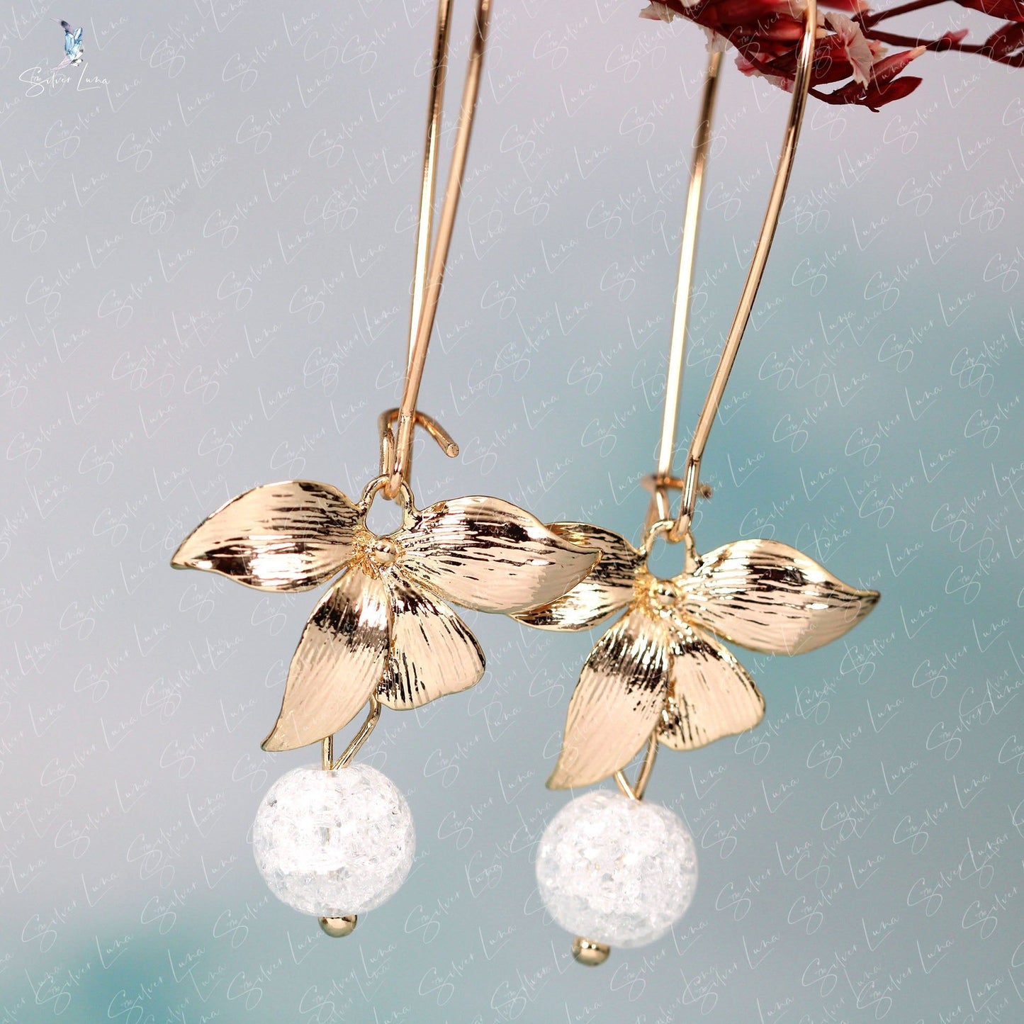 Gold plated orchid flower and stone drop earrings