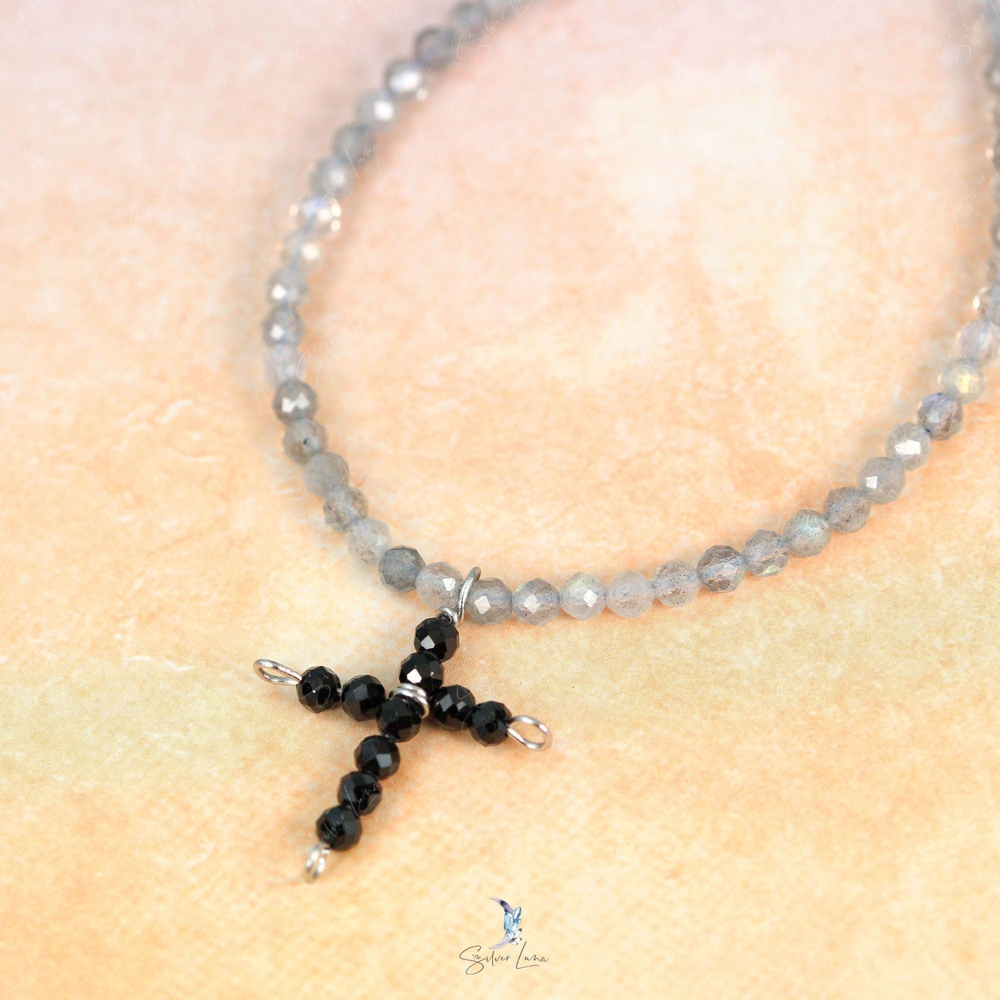 crucifix black cross beaded bracelet