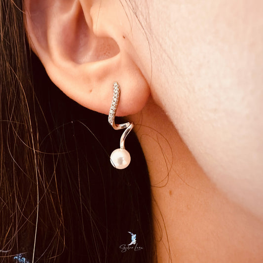 Wavy pearl sterling silver stud earrings