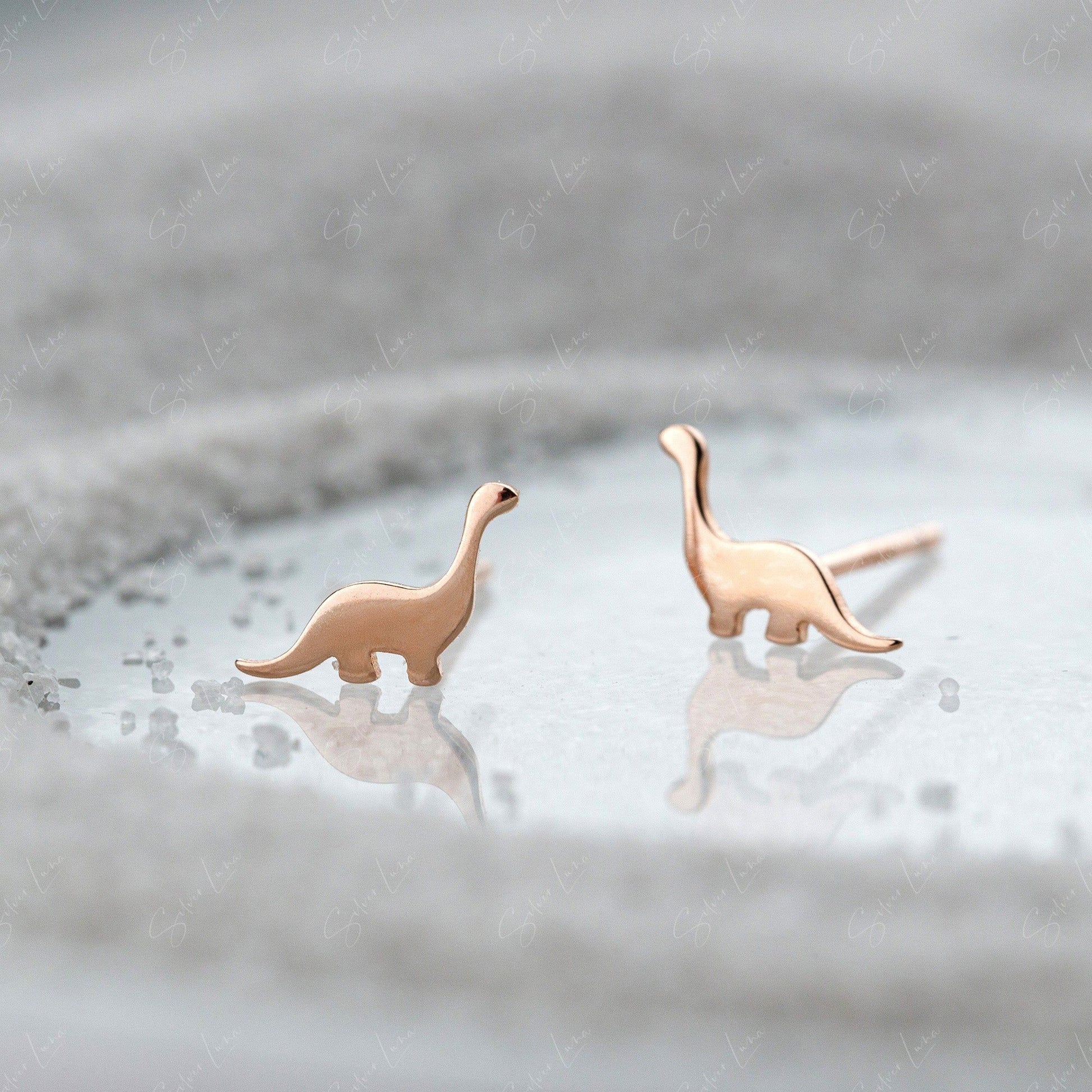 rose gold dinosaur stud earrings
