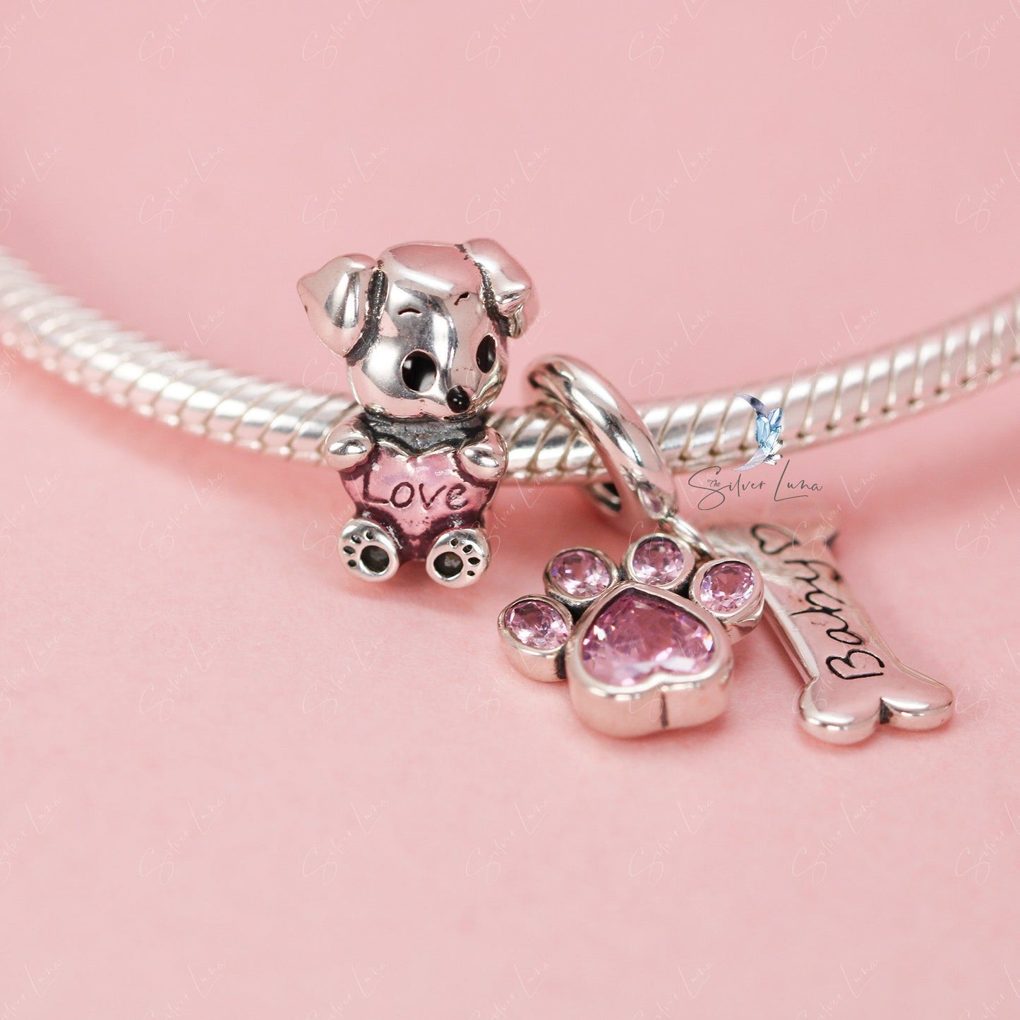 Dog holding heart sterling silver bead charm