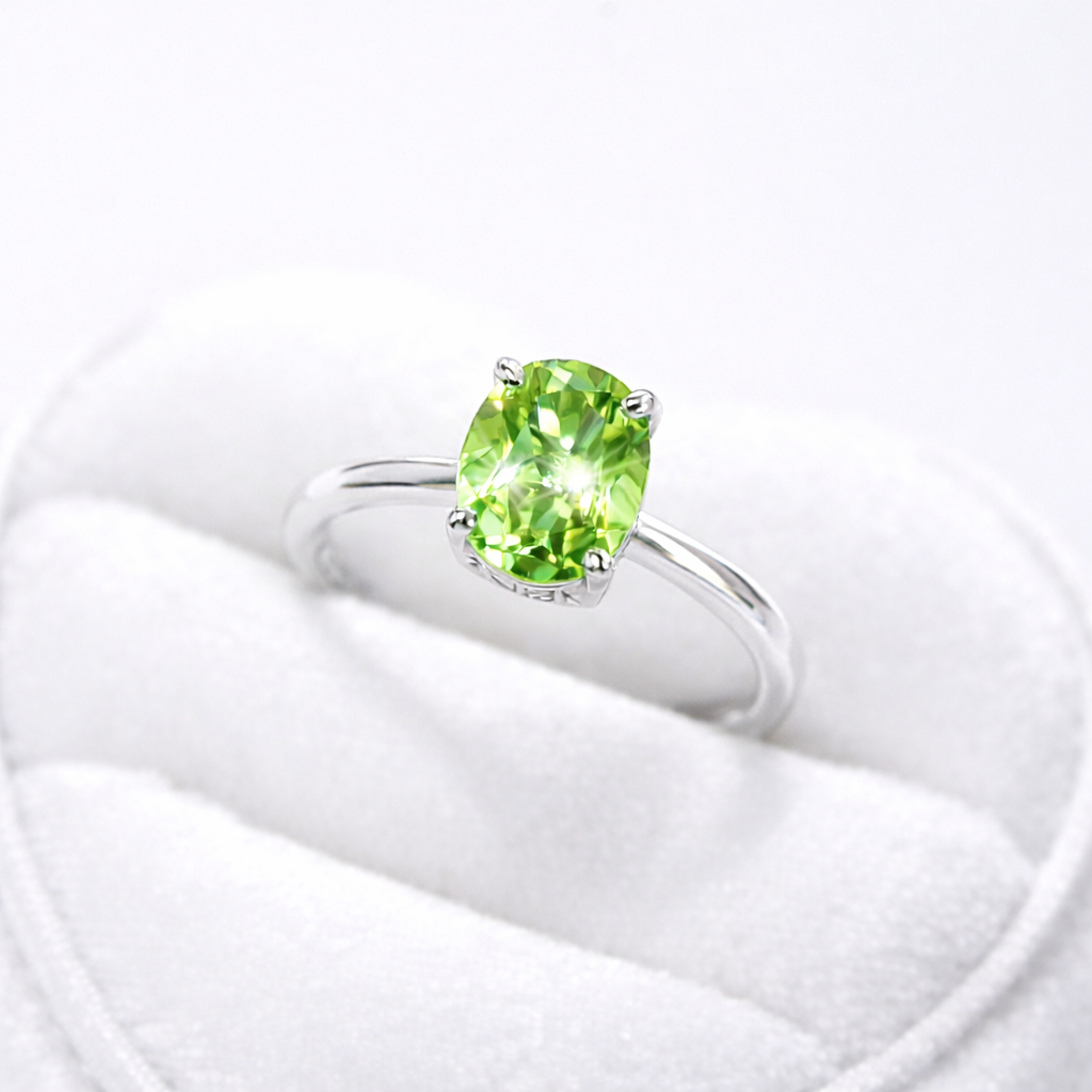 Natural peridot oval cut sterling silver ring