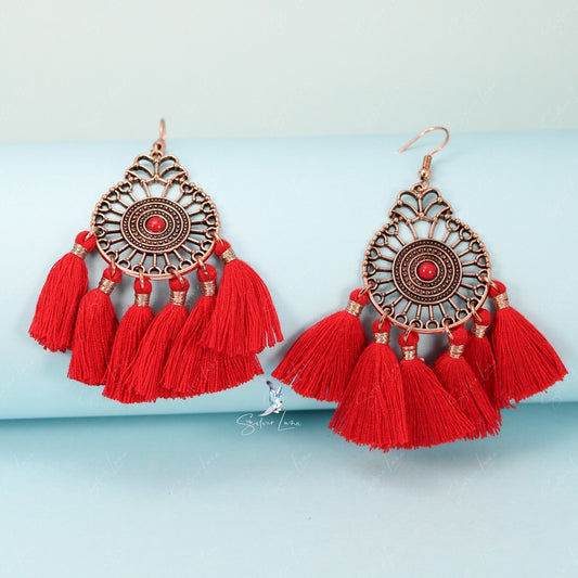 Red fan tassel statement earrings