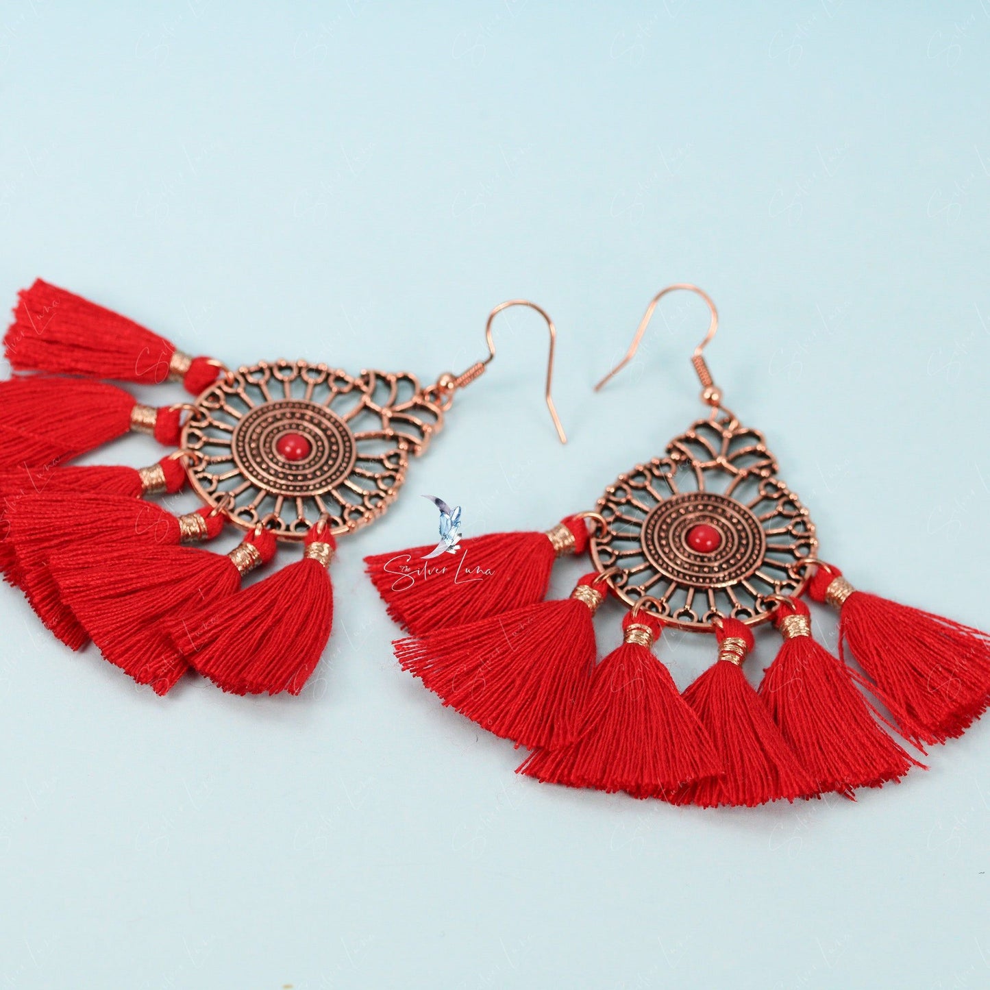 Red fan tassel statement earrings