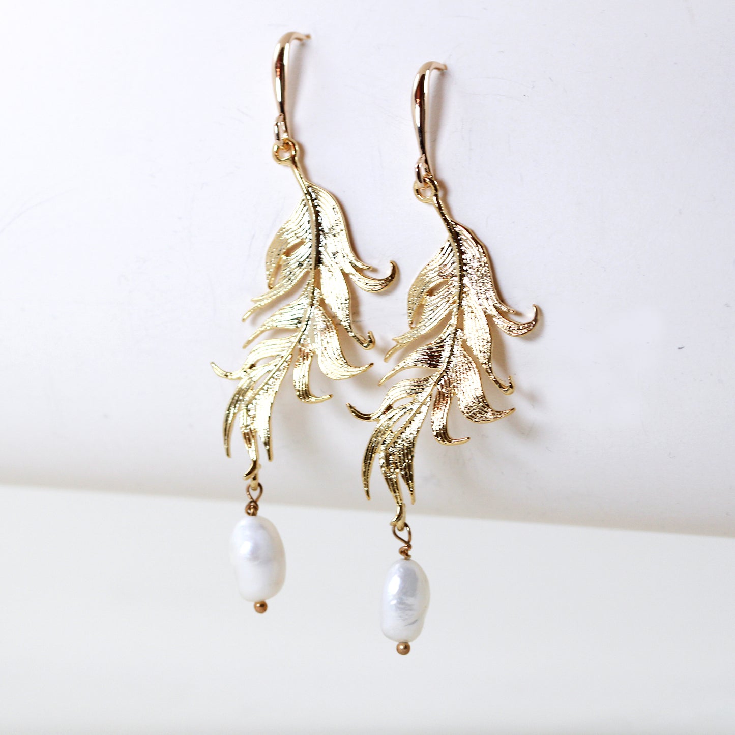 golden feather pearl drop bridal earrings