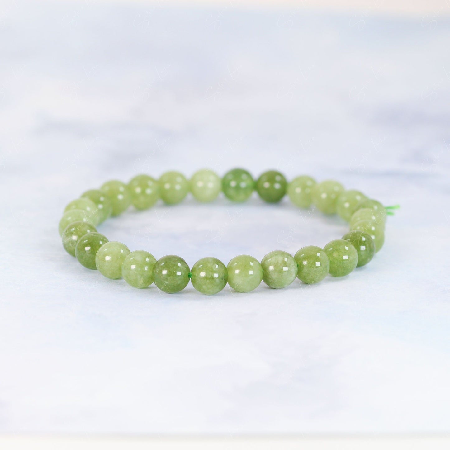 Ladybug bead charm green peridot beaded bracelet