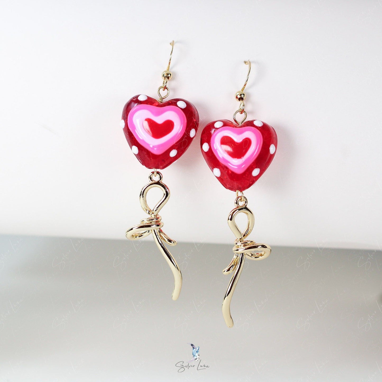 glass heart bead bowtie earrings