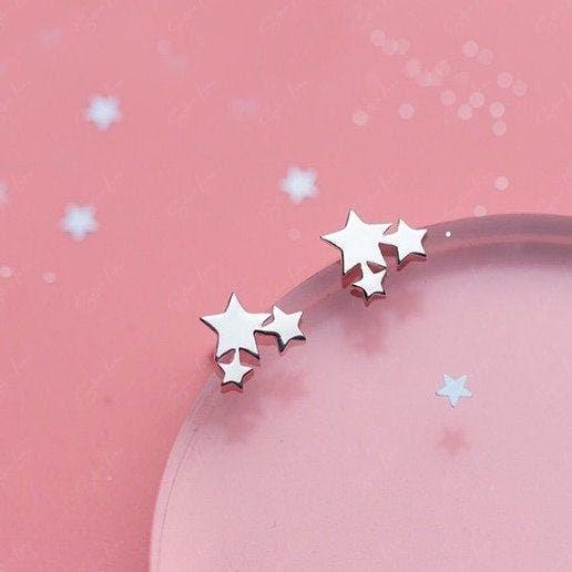 cluster of star stud earrings