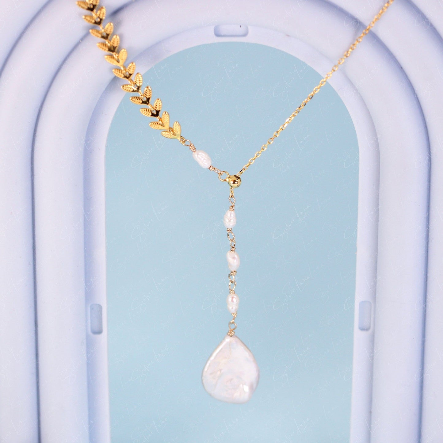 Lariat necklace with freshwater baroque pearls drop