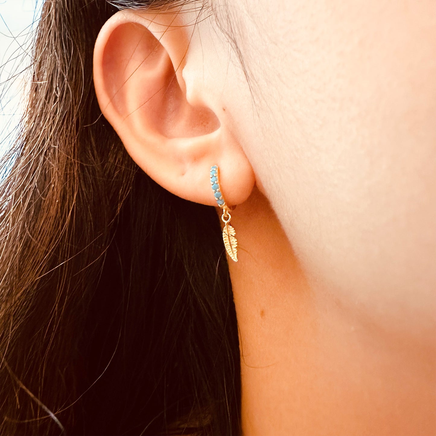 Gold plated blue cubic zirconias leaf hoop earrings