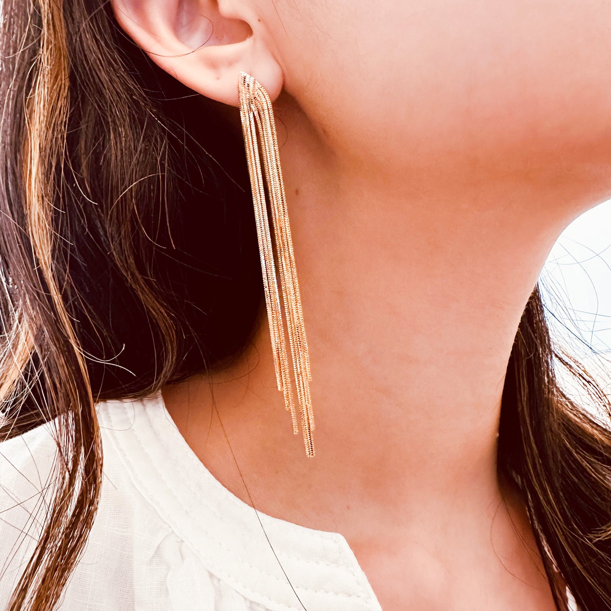 gold metal tassel long drop earrings