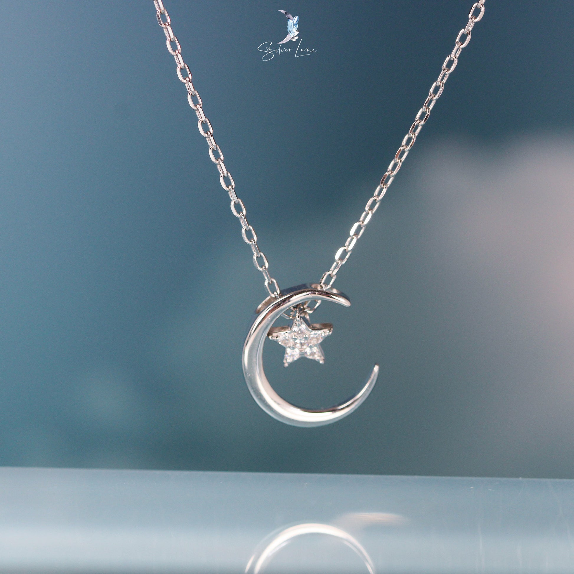 moon and star silver necklace