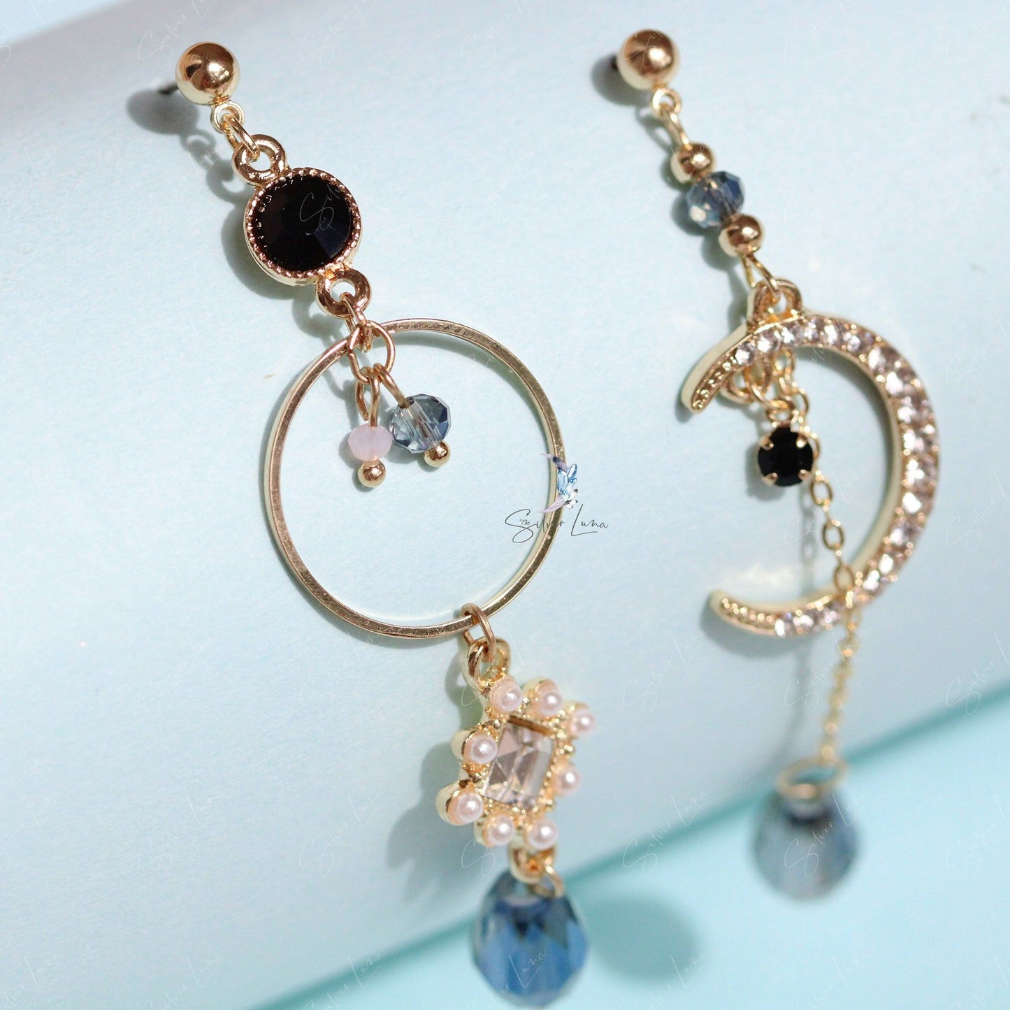 Long shiny crystal moon dangle drop earrings