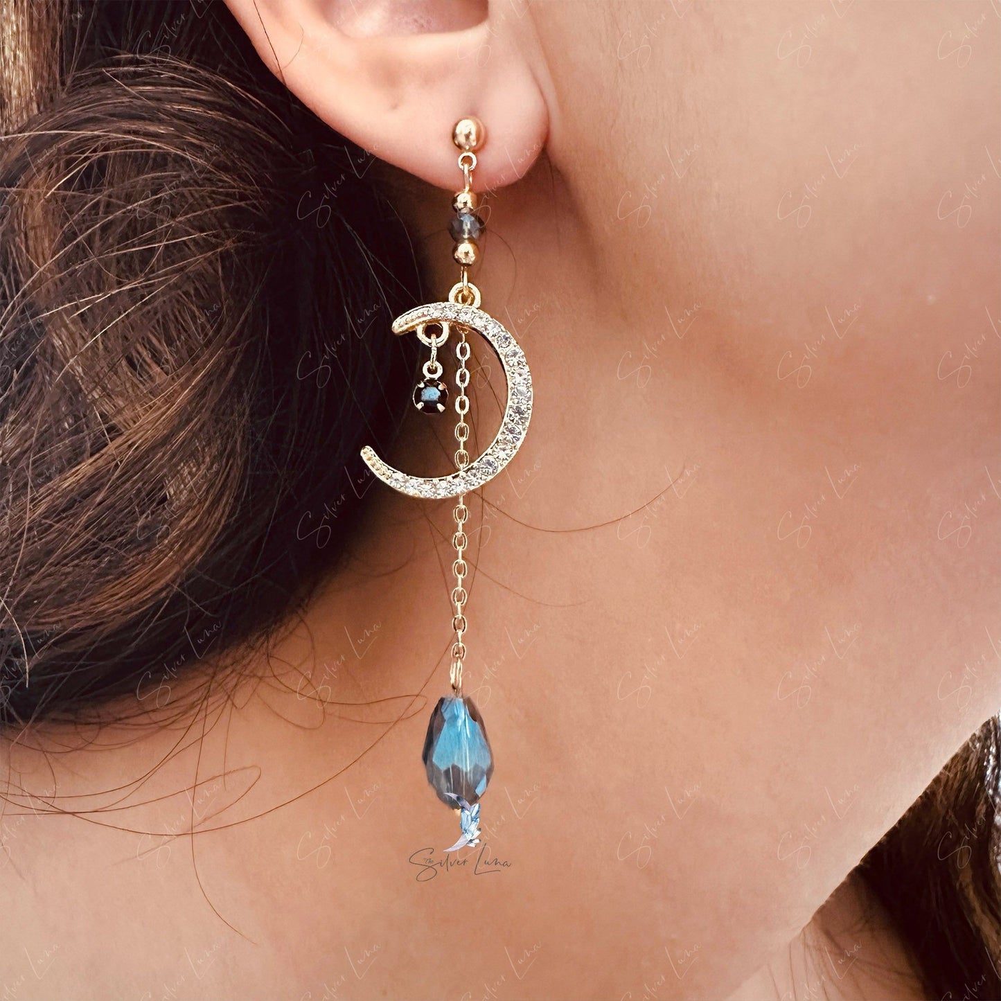 Long shiny crystal moon dangle drop earrings