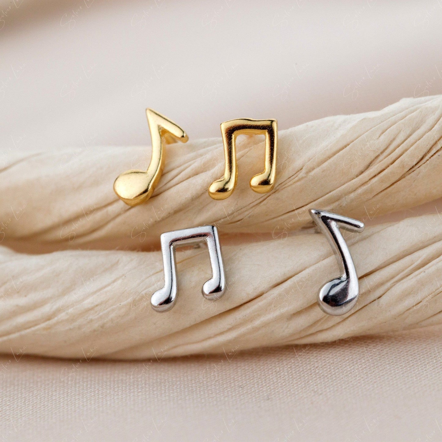 tiny music note stud earrings