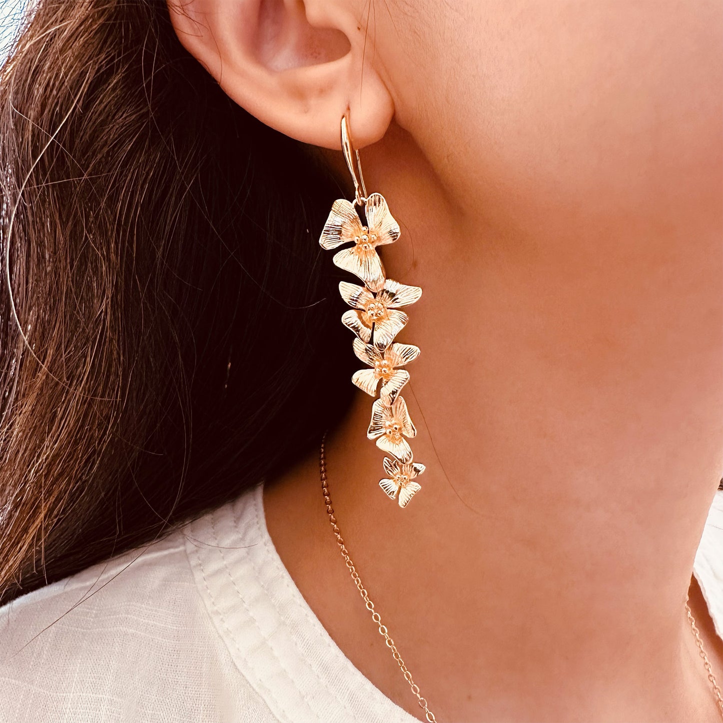 gold orchid flower earrings