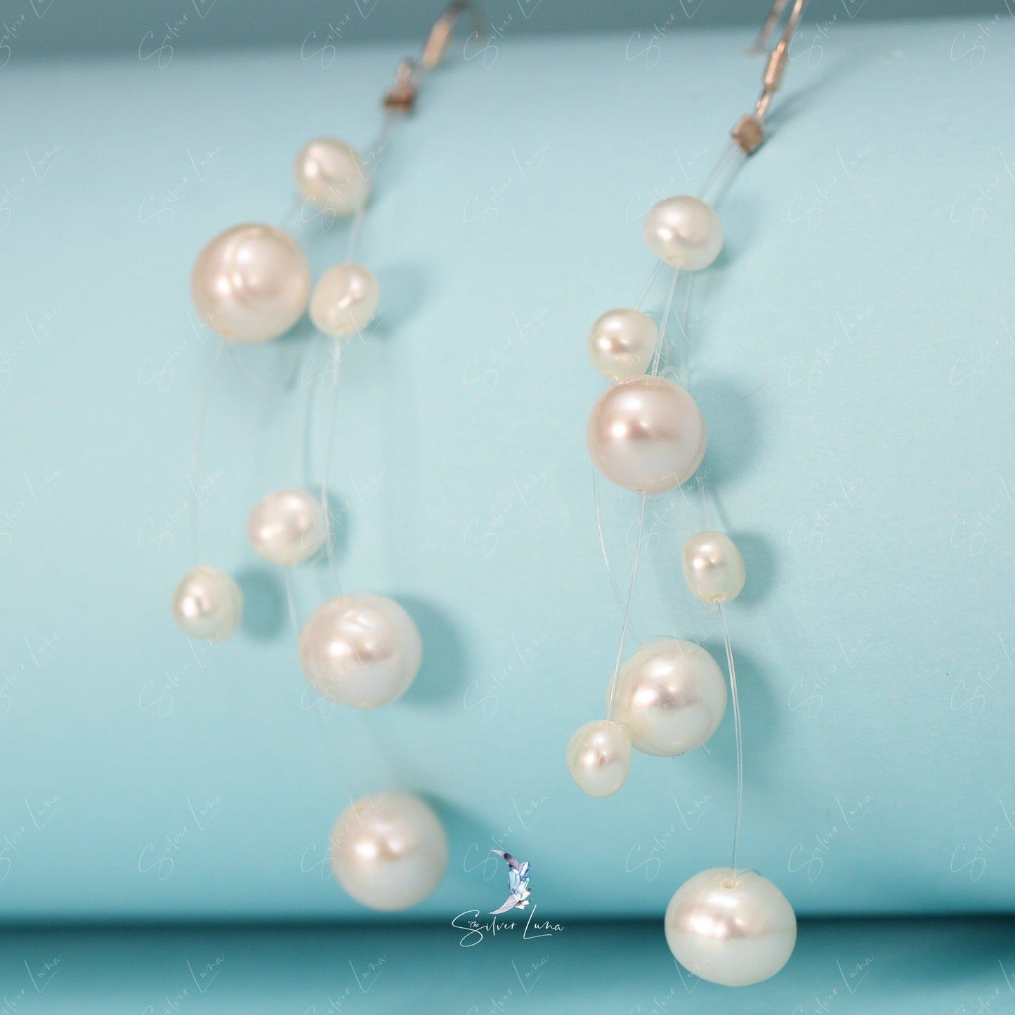 Floating pearls dangle drop earrings