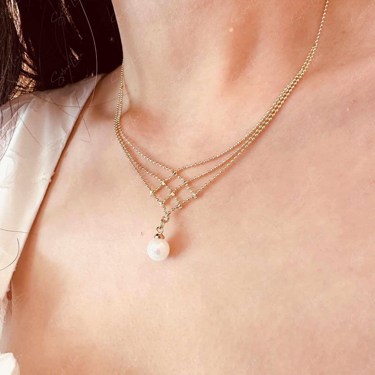 elegant pearl drop necklace