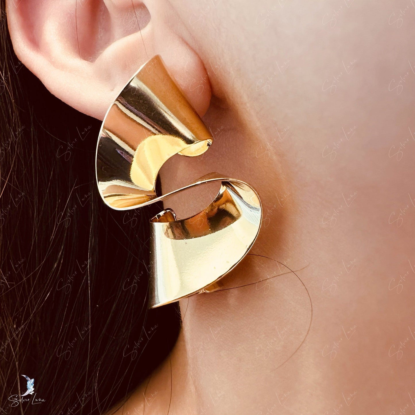 Pencil shave wave statement earrings