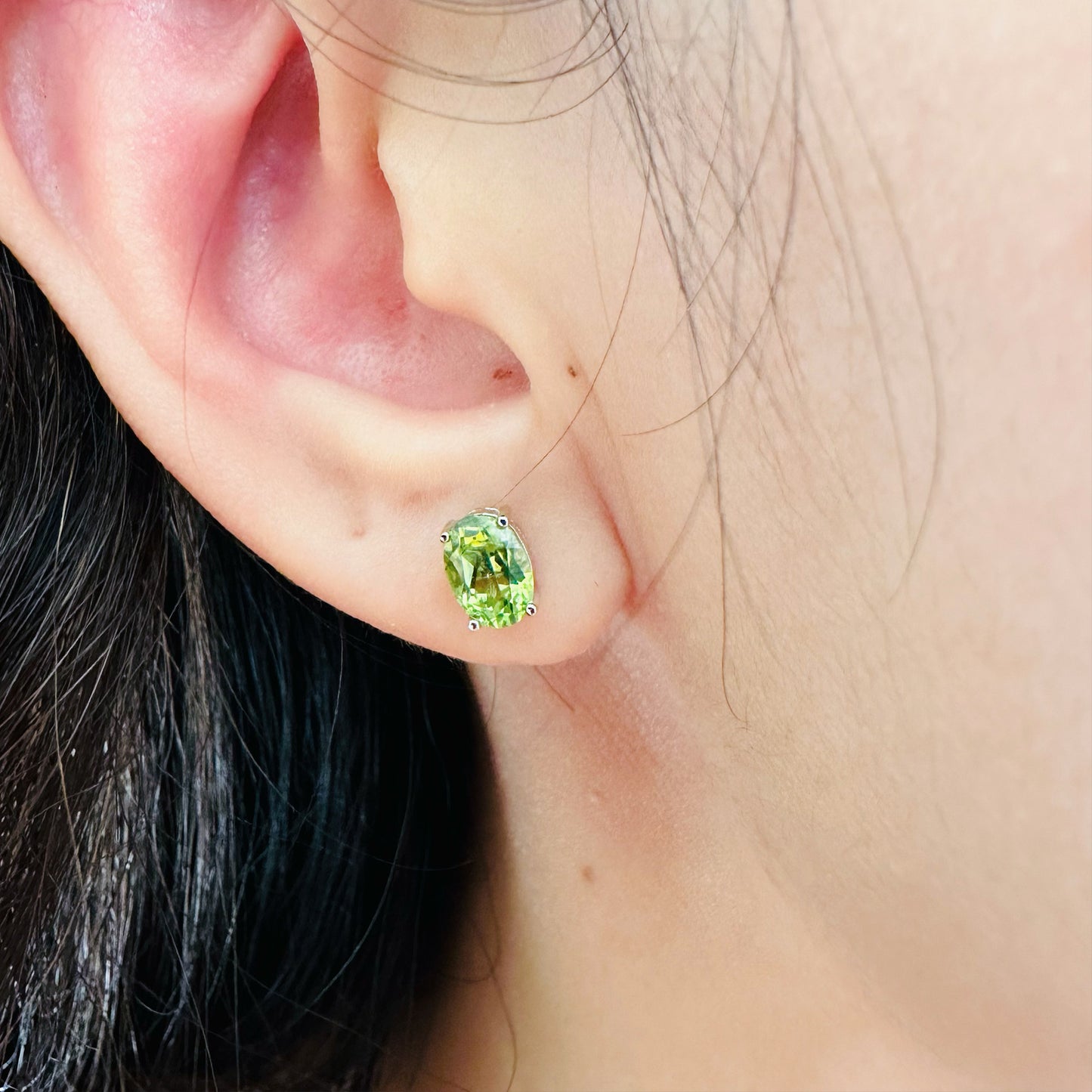 green peridot stud earrings