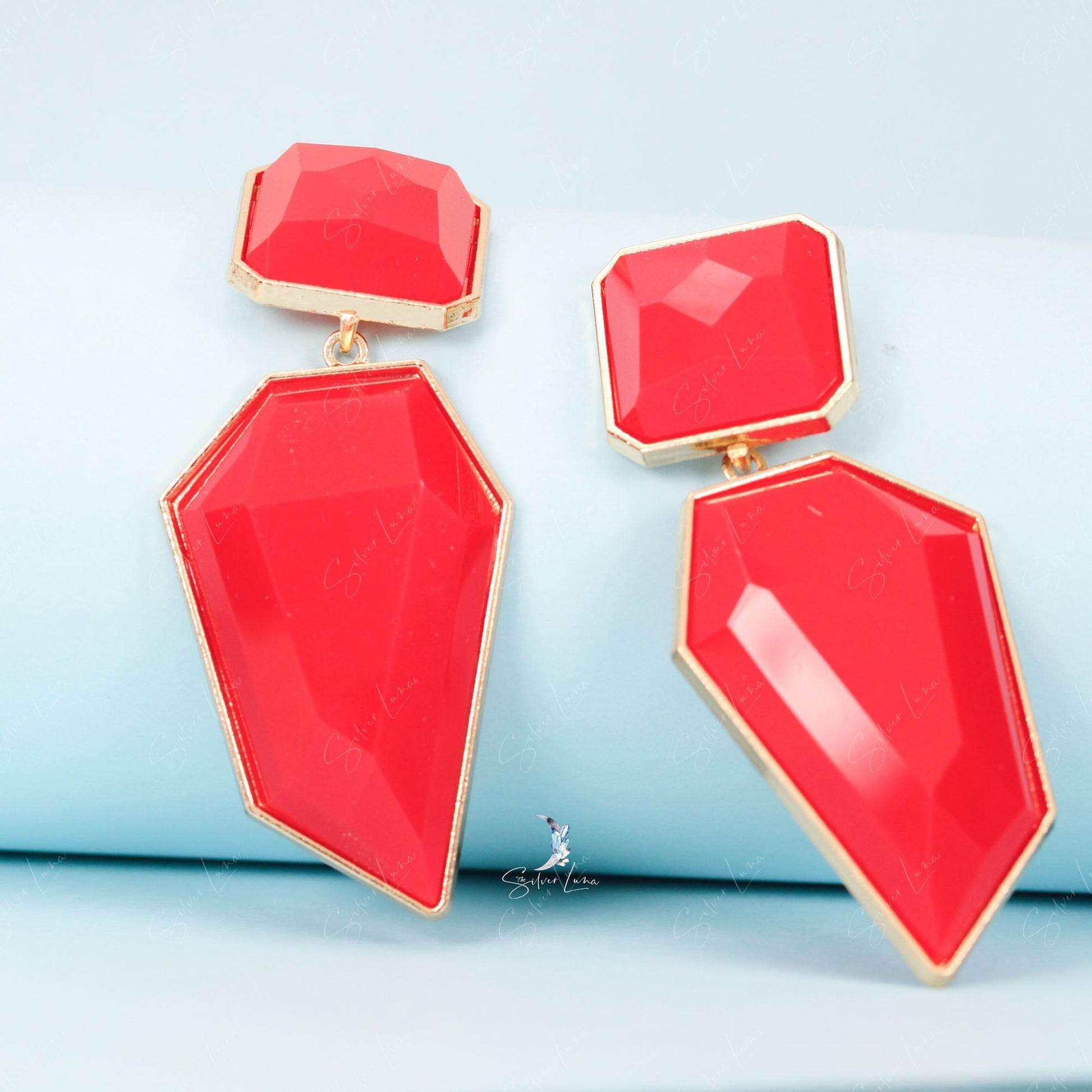 big red statement earrings