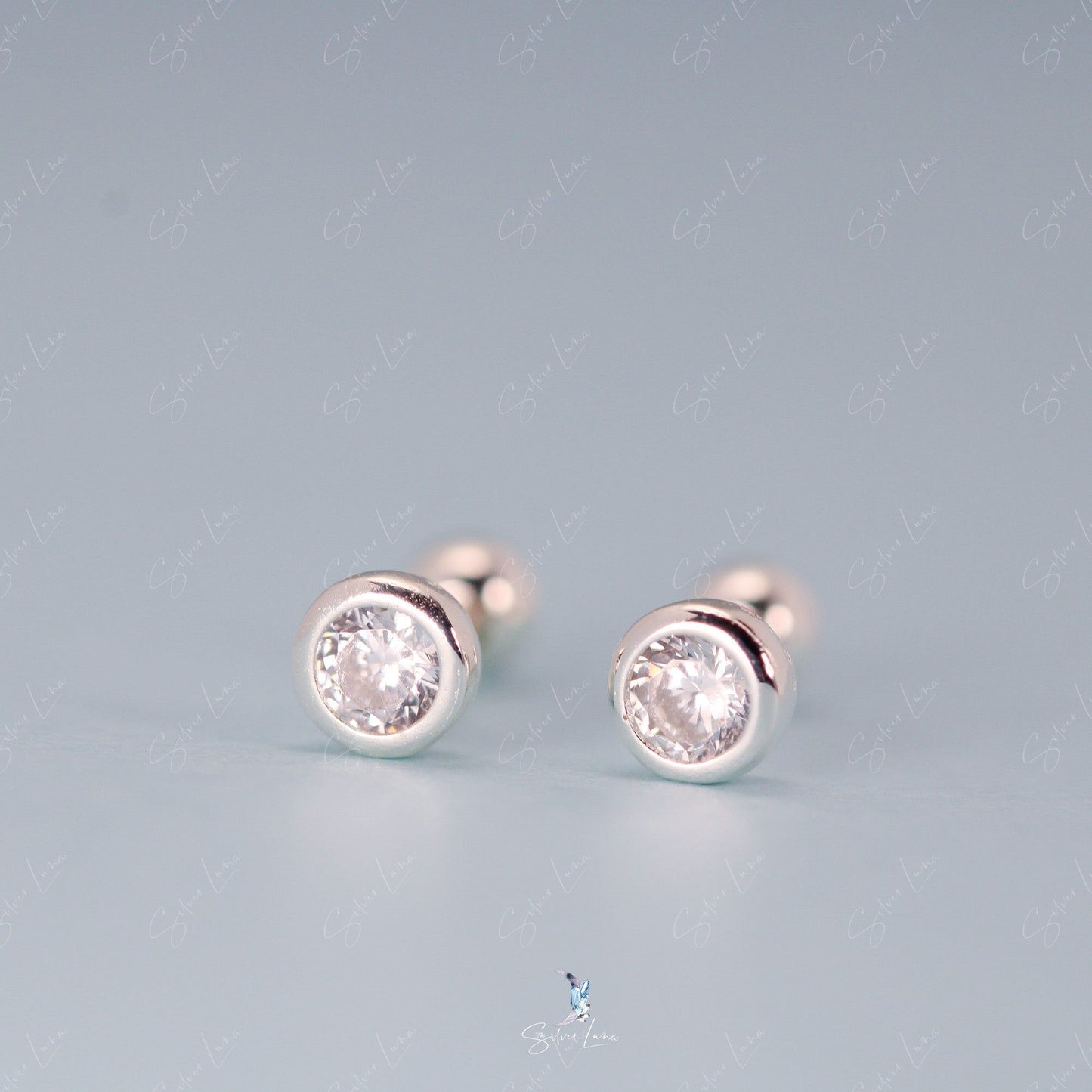 Solitaire cartilage screw back earrings