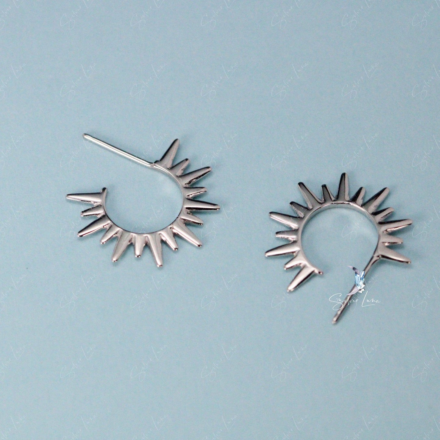 sun ray stud earrings