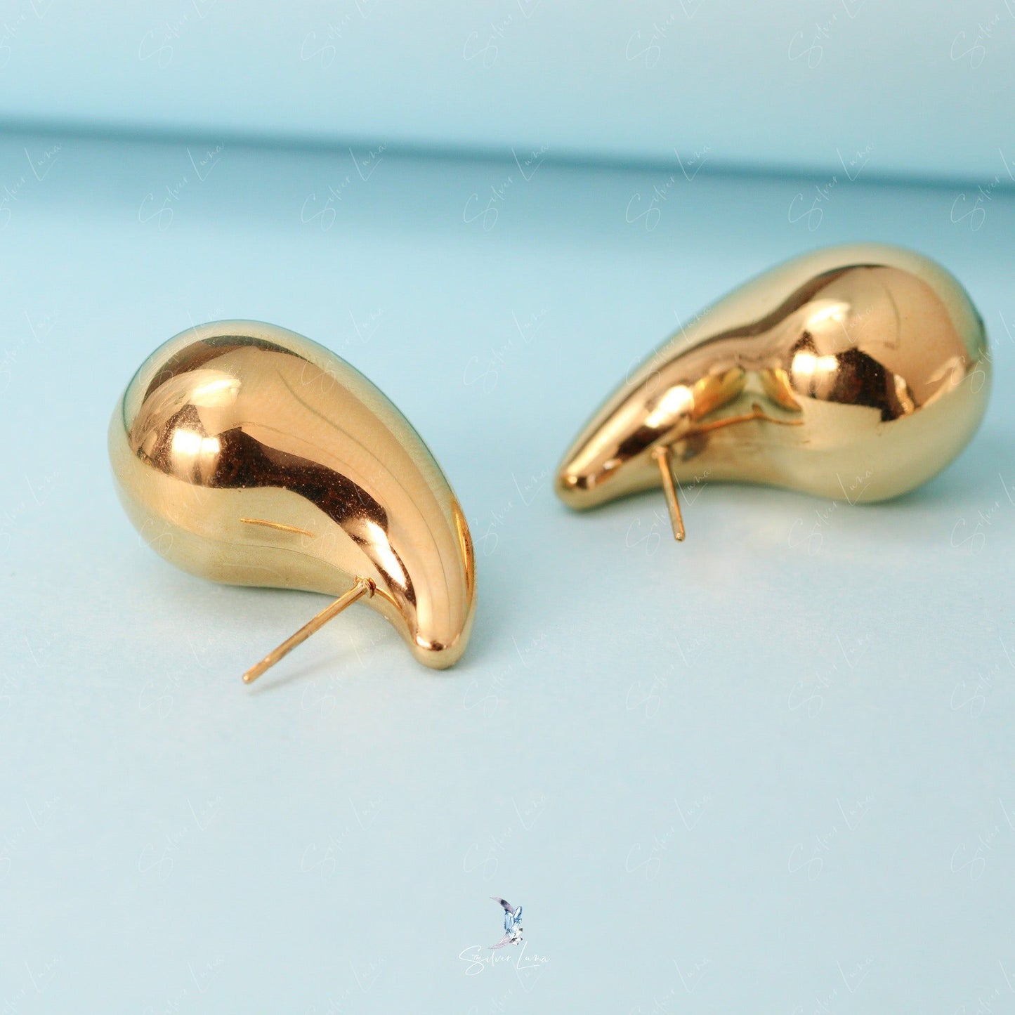 Golden water drop stud earrings