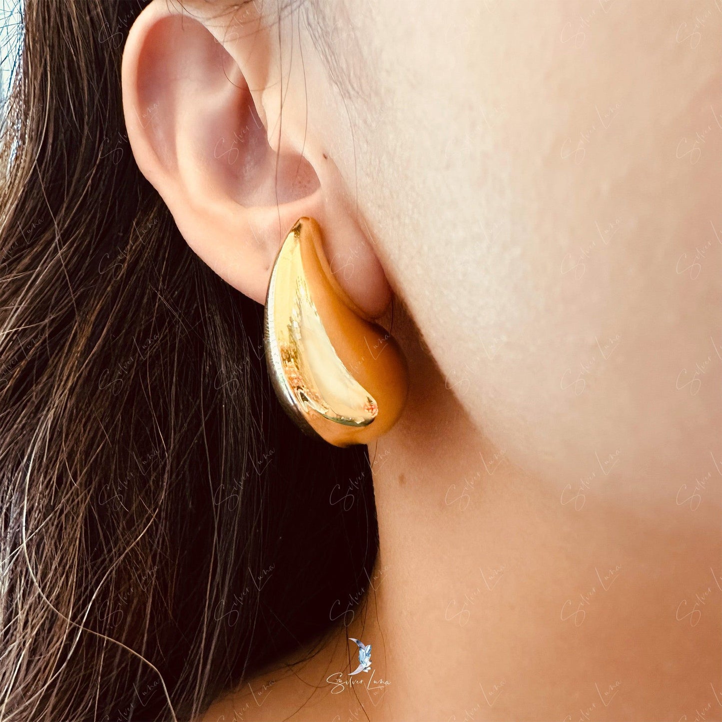 Golden water drop stud earrings