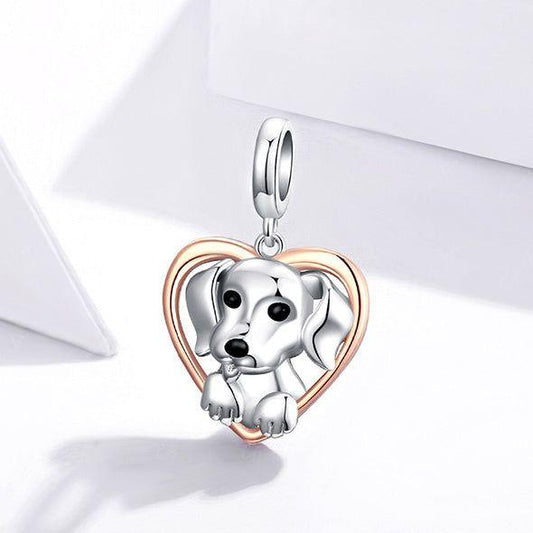 dog with heart dangle charm