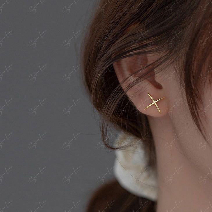 X silver stud earrings