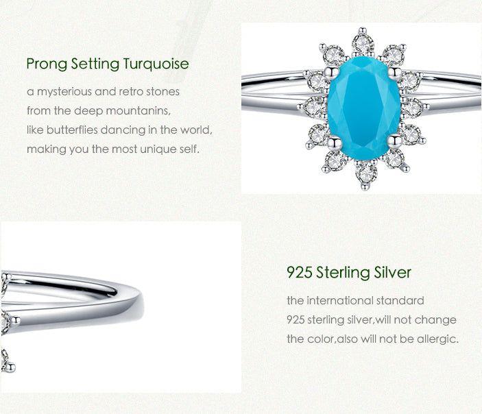 Halo cubic zirconia turquoise sterling silver ring