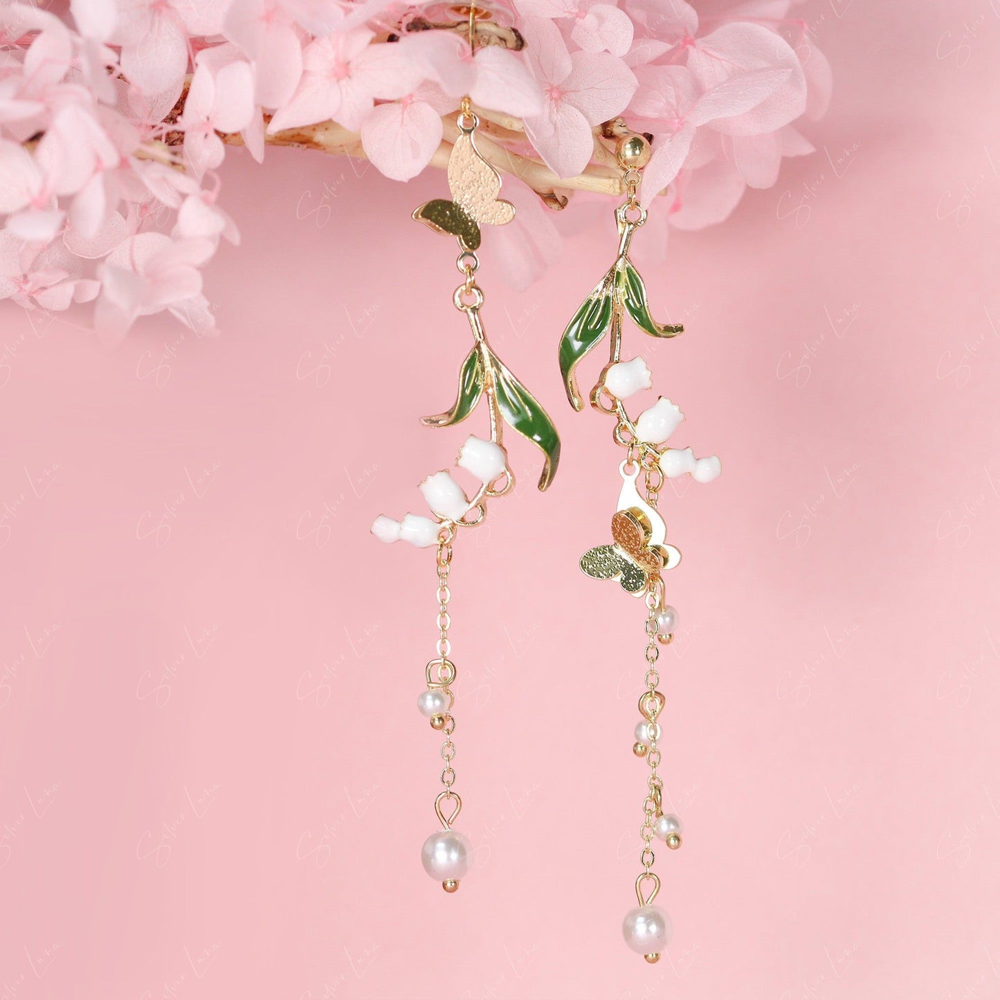 Butterfly enamel floral asymmetric drop earrings