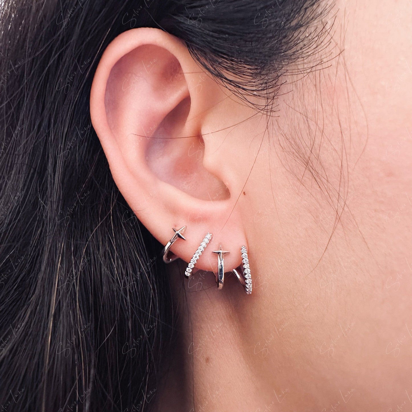 star claw stud earrings