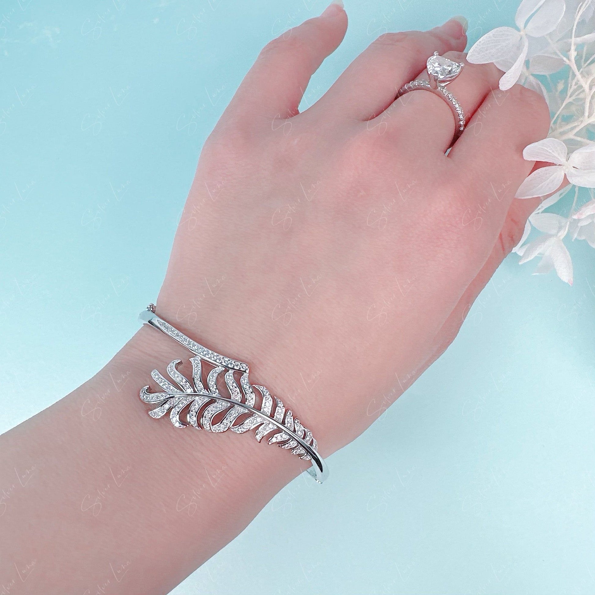 feature wrap silver bangle bracelet