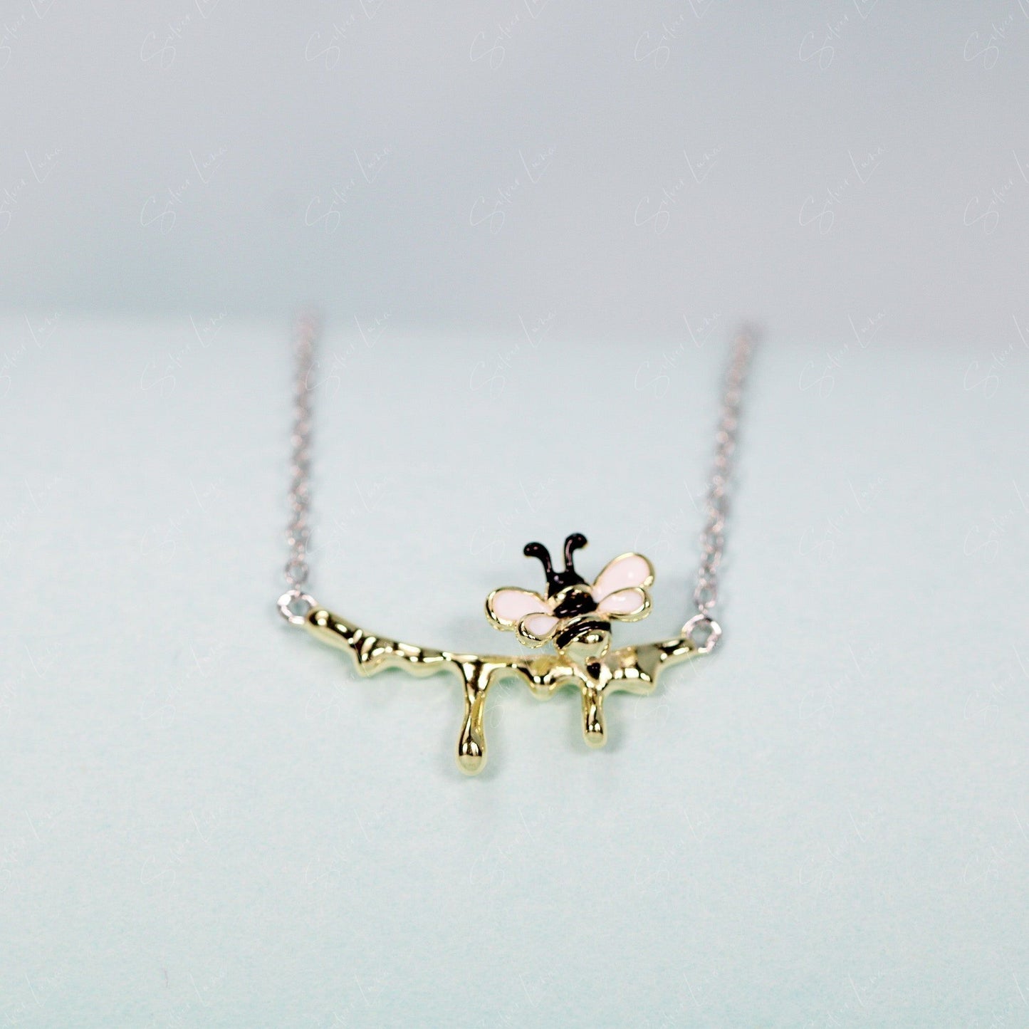melting bee pendant necklace