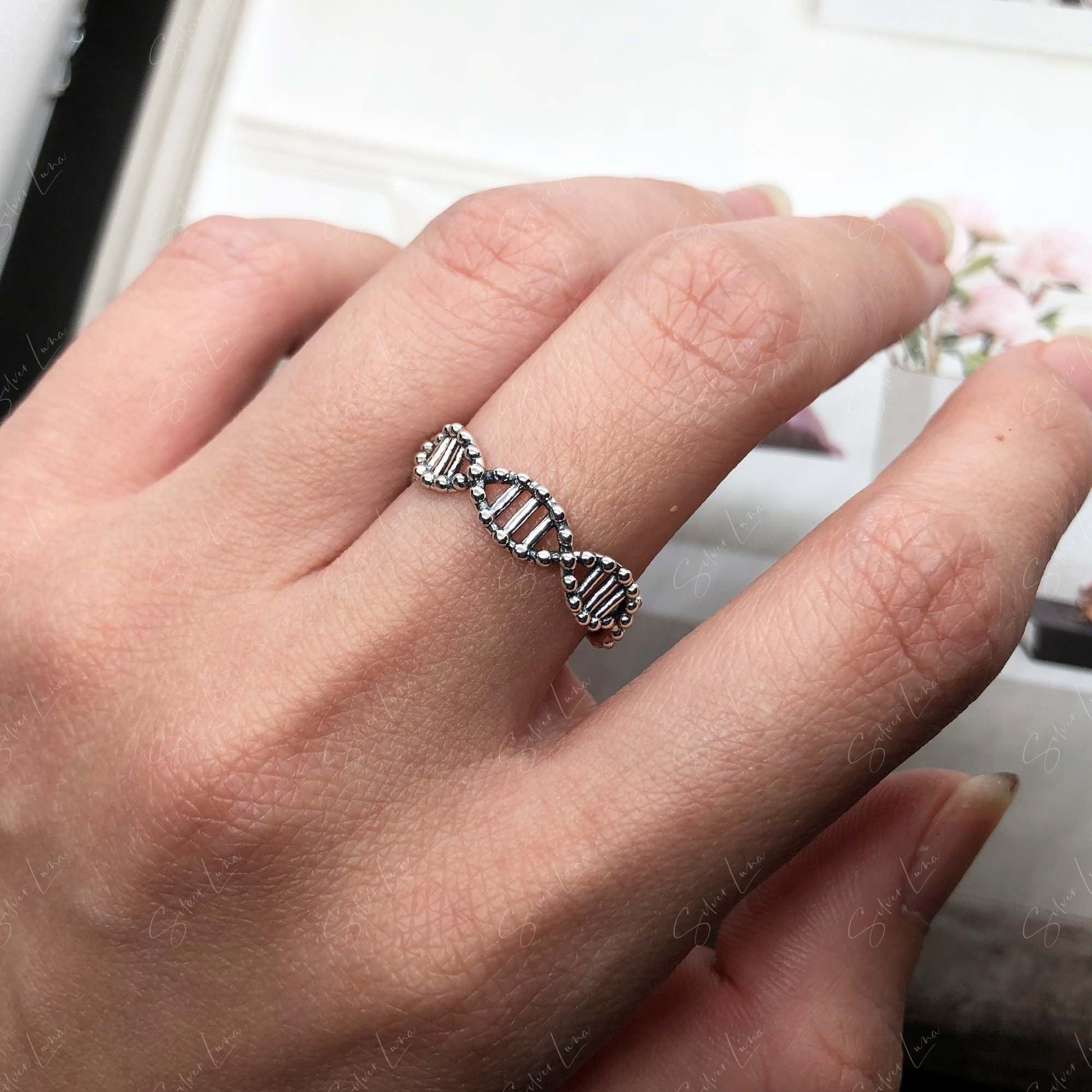 DNA strain sterling silver ring