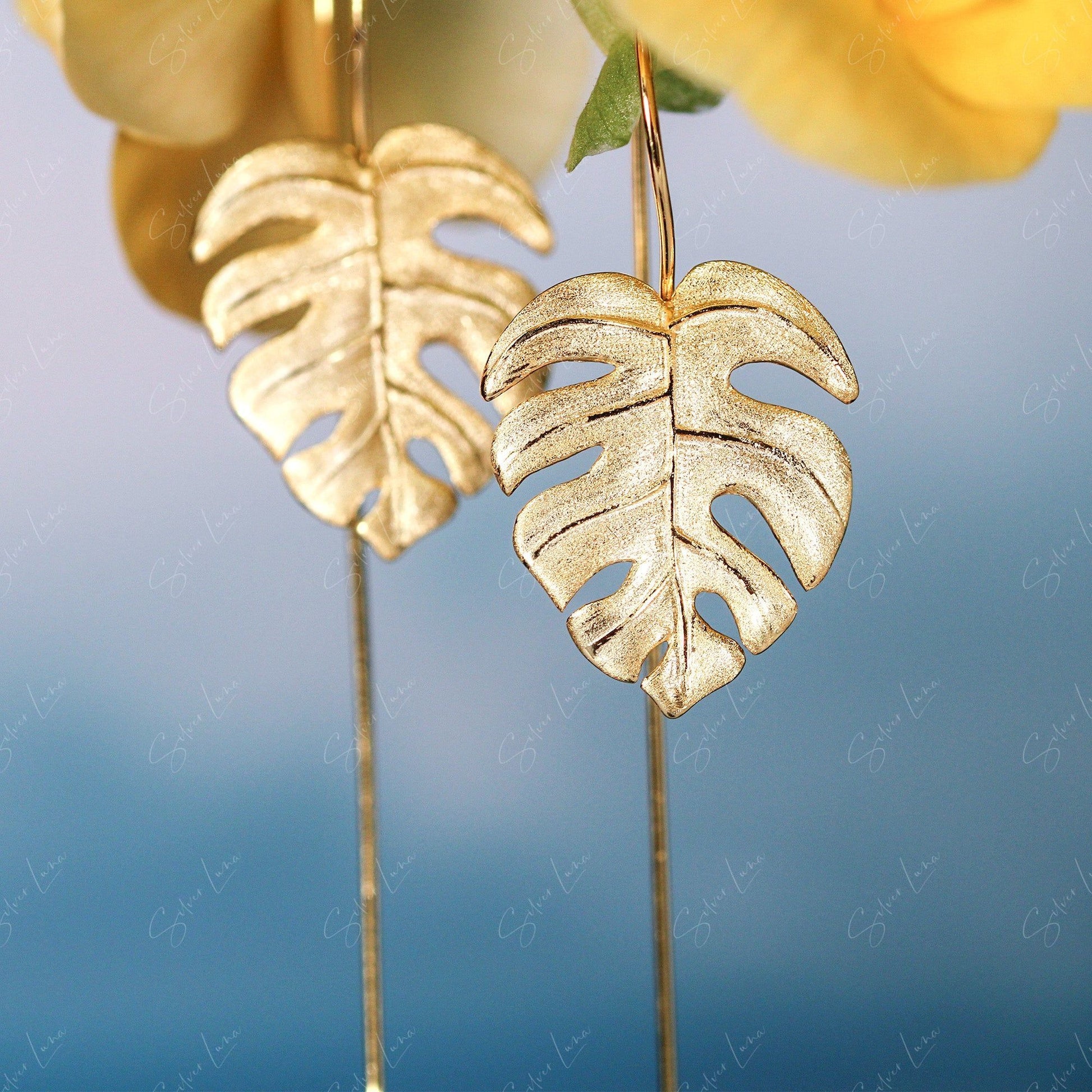 golden monstera leaf earrings