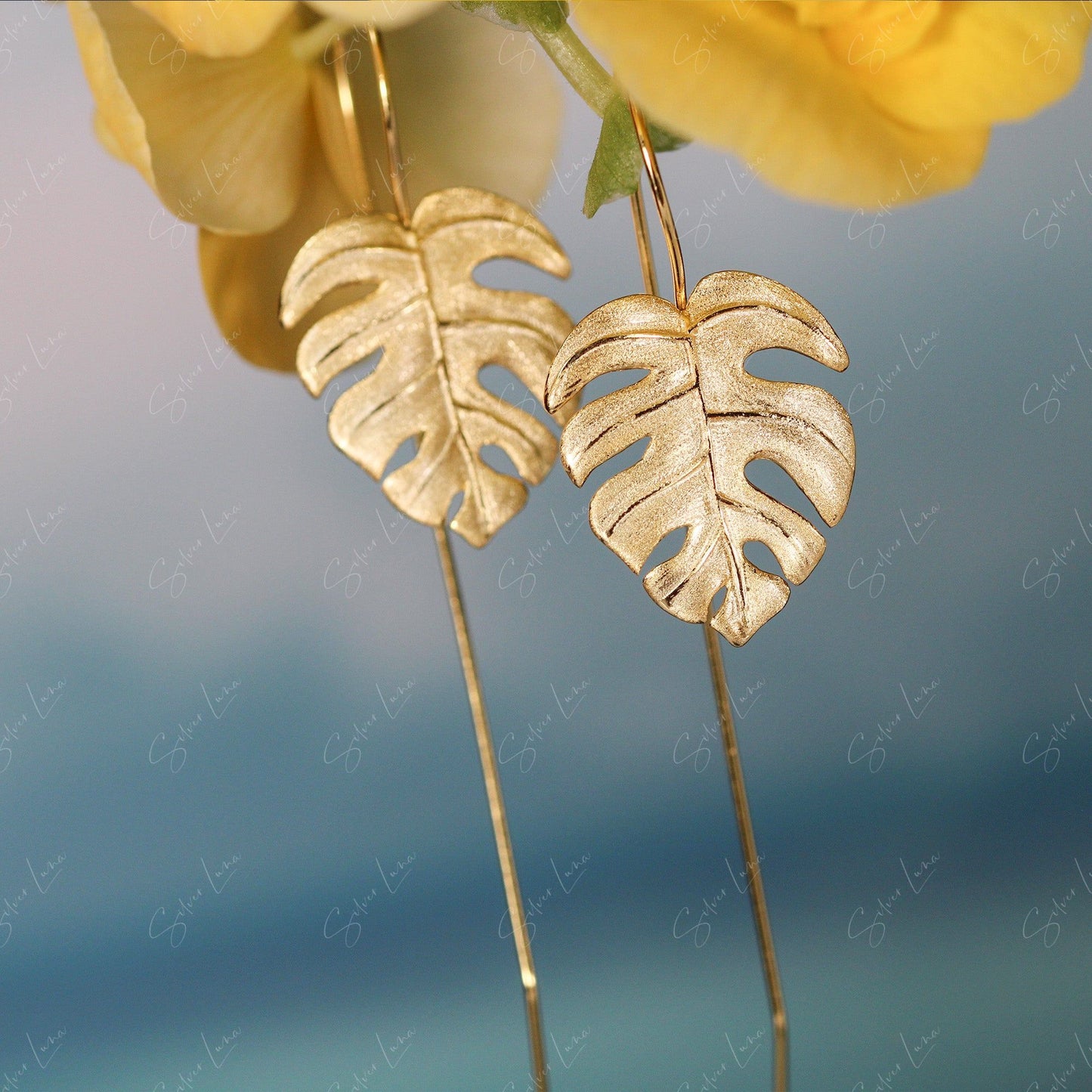 gold plated monster leaf earrings