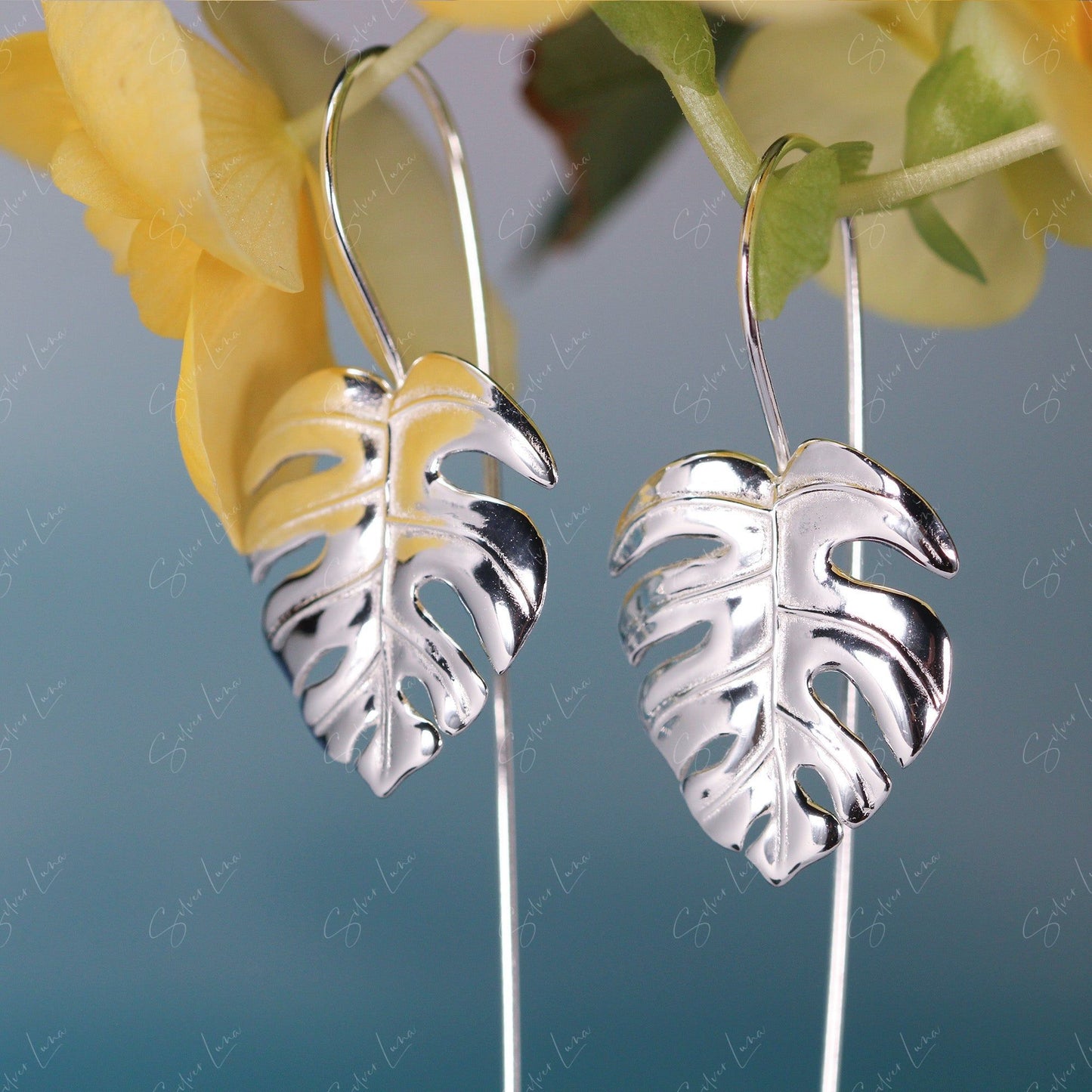 silver monstera leaves earrings
