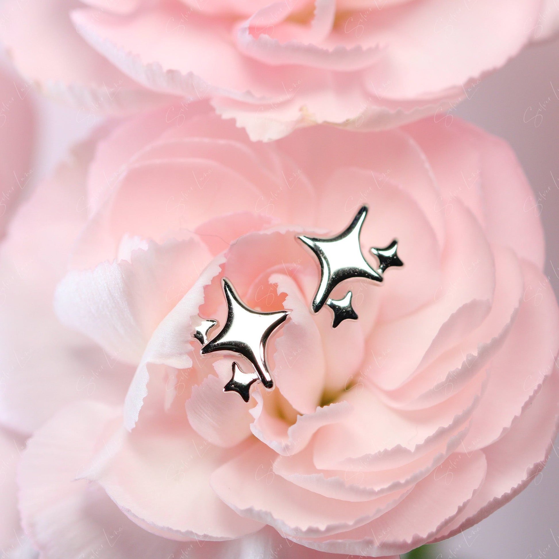 silver starburst stud earrings