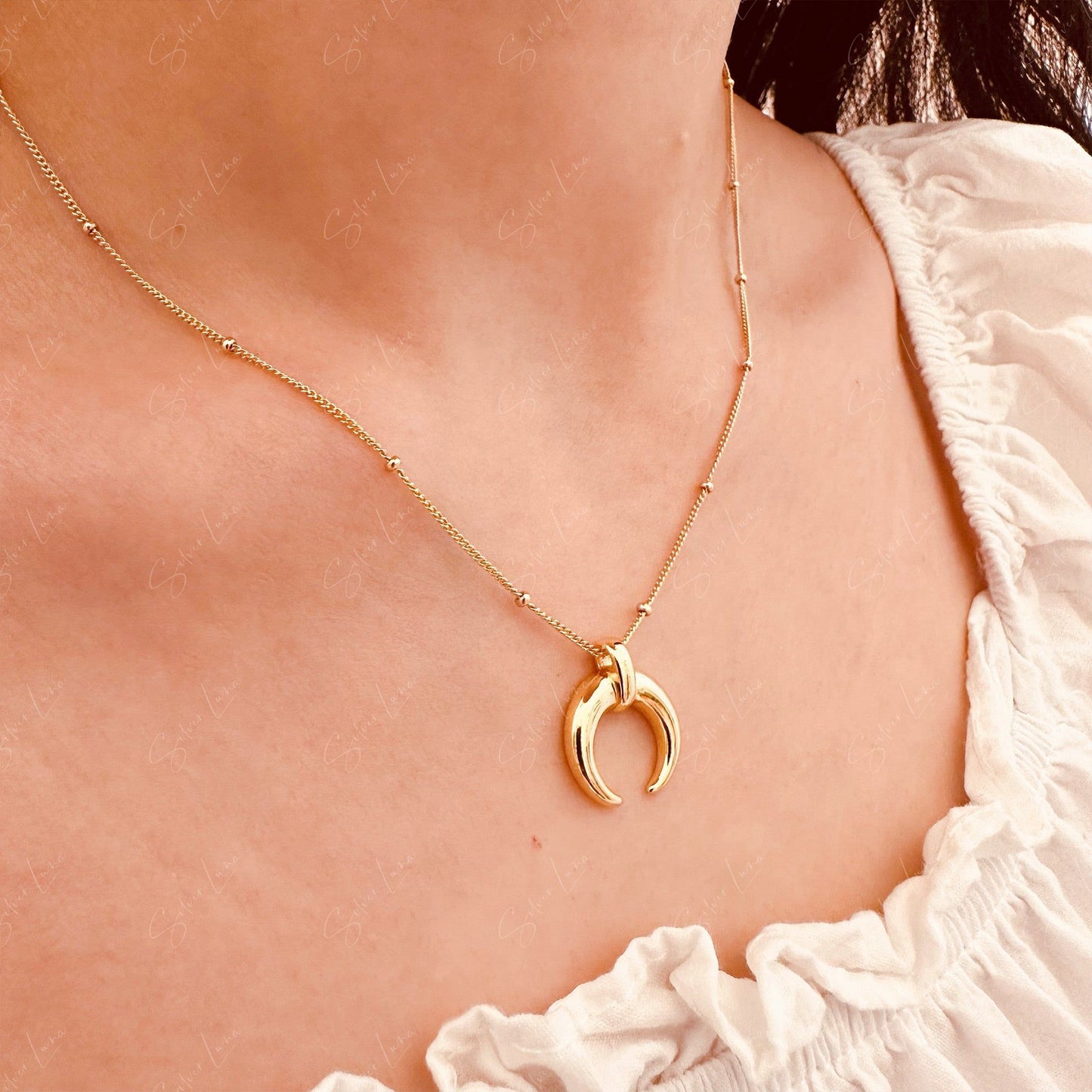 Golden crescent moon pendant necklace