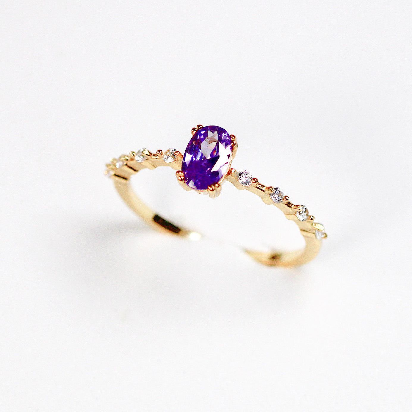 Purple cubic zirconia oval stone ring