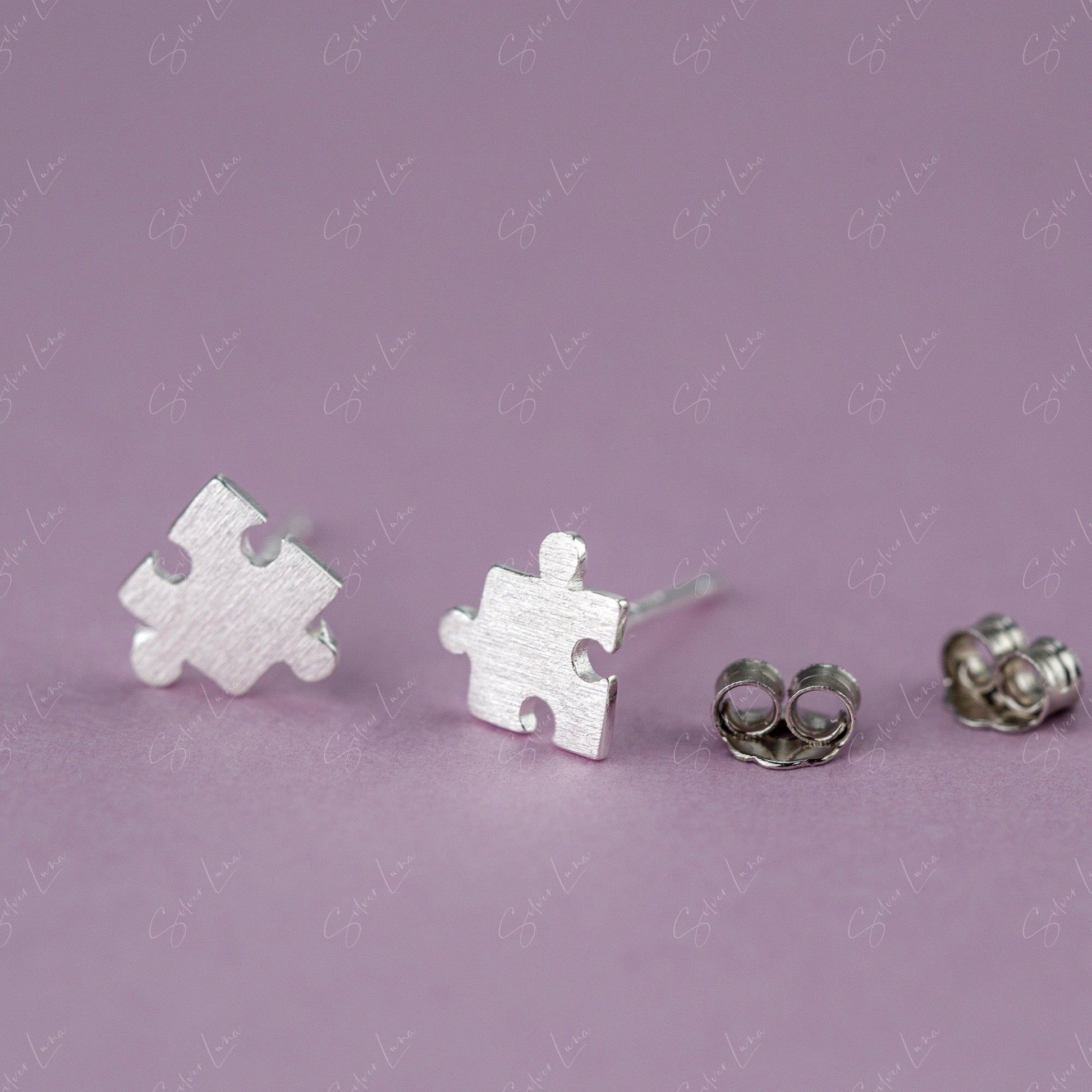 puzzle silver stud earrings